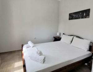 Postel nebo postele na pokoji v ubytování Electra Gaios Apartment