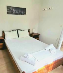 Postel nebo postele na pokoji v ubytování Electra Gaios Apartment