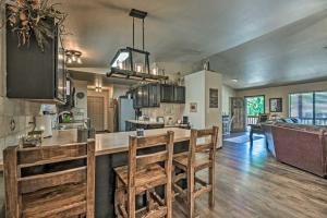a kitchen with a wooden counter top in a room at Wooded Ruidoso Hideaway with Deck Ski, Hike and Golf! in Ruidoso