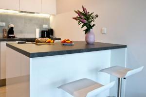 Kuchyňa alebo kuchynka v ubytovaní Marina Mokotow P&O Serviced Apartments