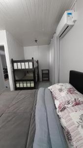 Ένα ή περισσότερα κρεβάτια σε δωμάτιο στο Casa Grey