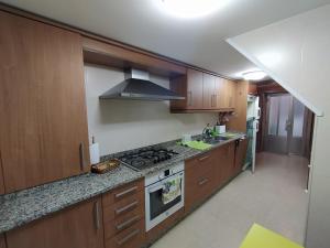Küche/Küchenzeile in der Unterkunft O Porto Mariñeiro