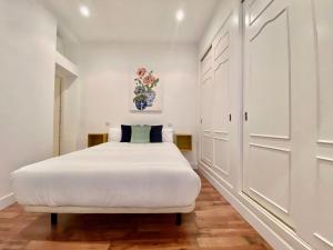 Postel nebo postele na pokoji v ubytování Malasaña Madrid - Apartamento de 1 dormitorio