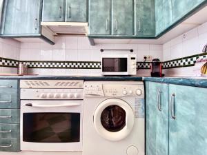 Kuchyň nebo kuchyňský kout v ubytování Malasaña Madrid - Apartamento de 1 dormitorio