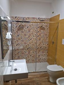 Kúpeľňa v ubytovaní Qvattro stagioni panoramic suites
