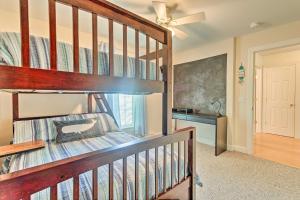 a bedroom with a bunk bed and a desk at South Kingstown Vacation Rental 2 Mi to Beach! in South Kingstown