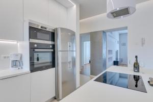 A kitchen or kitchenette at Apartment light in Pula