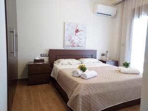 Säng eller sängar i ett rum på Luxury Summer Escape in Rhodes