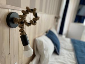 Posteľ alebo postele v izbe v ubytovaní Toskania Pokoje Goscinne