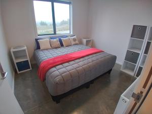 Letto o letti in una camera di Penny's Drop Inn