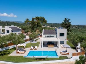 an aerial view of a villa with a swimming pool at Villa Plumeria in Tsilivi