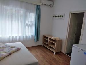 Postel nebo postele na pokoji v ubytování VilLa AdeLe