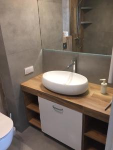 Kúpeľňa v ubytovaní Apartament Kraków Arena No. 100