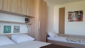 Postel nebo postele na pokoji v ubytování Apartman Mihalj Zadar-Rtina Miletici