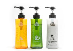 a group of three shampoo bottles sitting next to each other at APA Hotel Hakata Ekimae 2Chome in Fukuoka