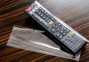 a remote control sitting on top of a table at APA Hotel Hakata Ekimae 2Chome in Fukuoka