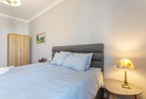 Postel nebo postele na pokoji v ubytování Pärnu Rüütli Apartments