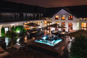 Bazén v ubytovaní Hotel Amazonka Conference and Spa alebo v jeho blízkosti