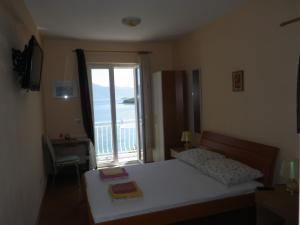 Posteľ alebo postele v izbe v ubytovaní S1 - studio just 50m from the beach with sea view