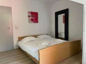 Un pat sau paturi într-o cameră la Appartement 5 Willingen