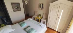 Postel nebo postele na pokoji v ubytování Apartments Veronika