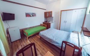 Μια τηλεόραση ή/και κέντρο ψυχαγωγίας στο Filip Apartments