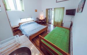 Ένα ή περισσότερα κρεβάτια σε δωμάτιο στο Filip Apartments