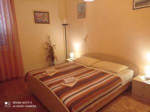 Voodi või voodid majutusasutuse Rooms Šećer toas