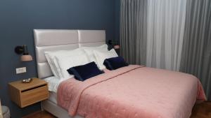Postel nebo postele na pokoji v ubytování Etal Luxury Apartment