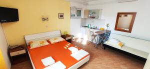 Postel nebo postele na pokoji v ubytování Apartments Veronika