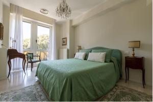 A bed or beds in a room at Casa Lazzarini luxury apartment