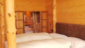 Postel nebo postele na pokoji v ubytování Albergo Gasthof zur Krone