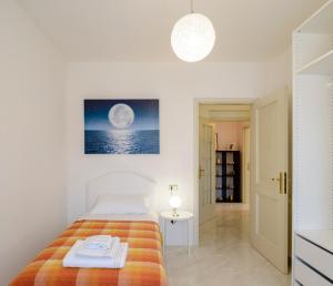 A bed or beds in a room at Appartamento Zappacenere