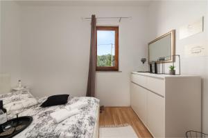 Kuchyň nebo kuchyňský kout v ubytování Lento Apartment