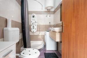 Koupelna v ubytování Lento Apartment