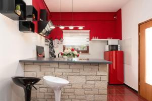 Kuchyň nebo kuchyňský kout v ubytování Lento Apartment + 37 fotografií