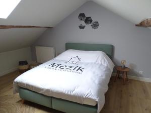 Postel nebo postele na pokoji v ubytování Vakantiewoning Mèzik
