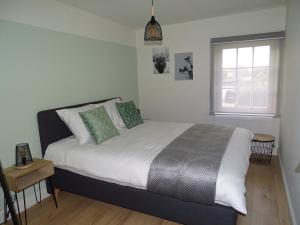 Postel nebo postele na pokoji v ubytování Vakantiewoning Mèzik