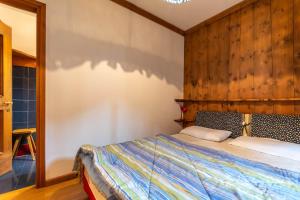 Postel nebo postele na pokoji v ubytování Ski Residence 3B