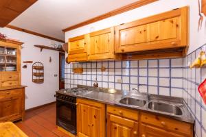 Kuchyň nebo kuchyňský kout v ubytování Ski Residence 3B