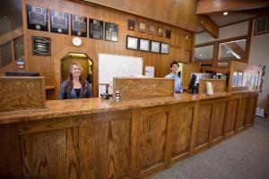 two women are standing at a counter in a salon at Club Tahoe Resort in Incline Village