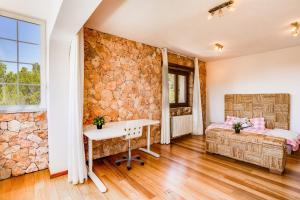 Postel nebo postele na pokoji v ubytování Villa Portals Nous 2