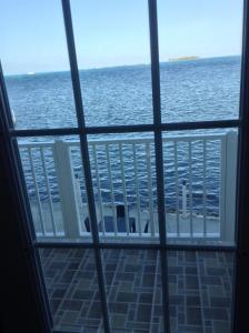 a view of the ocean from a window at Haynes Cay View in San Andrés