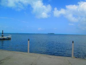 a view of a large body of water with a dock at Haynes Cay View in San Andrés