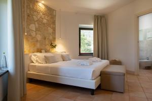 Posteľ alebo postele v izbe v ubytovaní Giotto Country House & Spa
