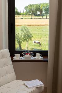 Posedenie v ubytovaní Giotto Country House & Spa