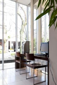 TV a/nebo společenská místnost v ubytování 7 Days Hotel Plus