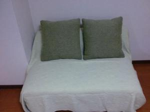 Postel nebo postele na pokoji v ubytování Hotel Raizan North