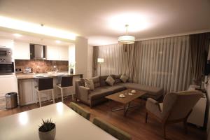 Kuchyň nebo kuchyňský kout v ubytování Paşapark Selçuklu Hotel