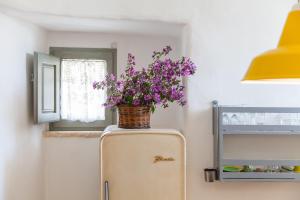 A cozinha ou kitchenette de Trulli 18cinquantanove